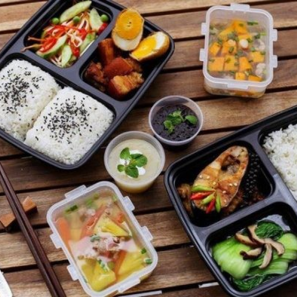 op 3 địa chỉ bán cơm trưa văn phòng quận 2 giao tận nơi, giá rẻ